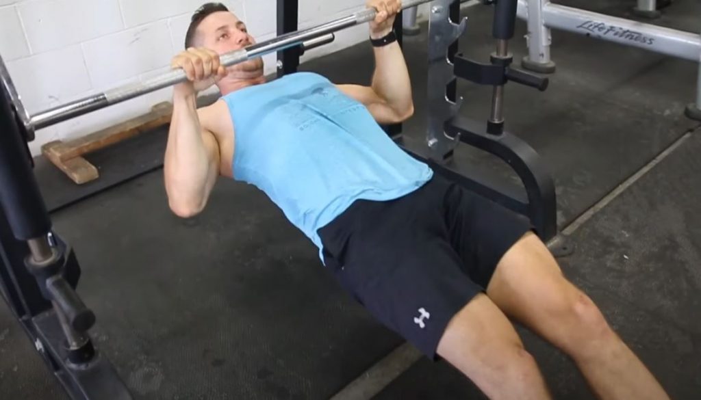 Man doing inverted row